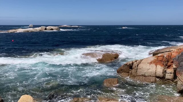 Rugged granite boulder shoreline and small islands near Bicheno on Tasmania's east coast