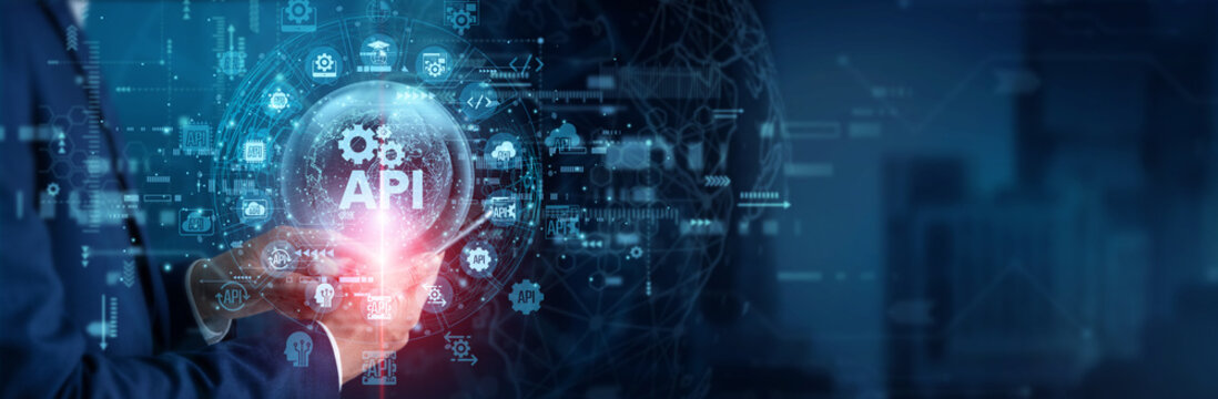 Software developer touching smartphone with glowing API hologram, connecting cloud applications through programming interfaces, automated data exchange, integrations and secure service requests.
