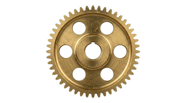 Close-up of brass gear with circular perforations and detailed teeth