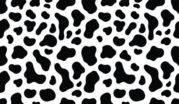 Black and white cow pattern texture with organic shapes on a clean background for textile design