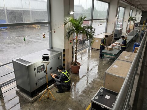Workers Manage Tropical Rainy Season Holiday Operations In E-commerce Warehouse