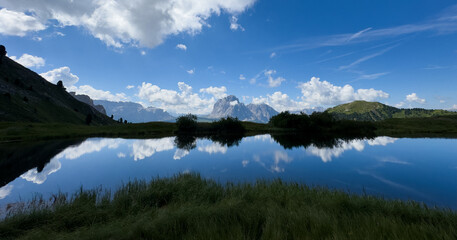 Fototapeta premium Idyllic summer landscape with clear mountain lake in the Alp 