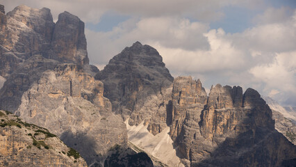 Fototapeta premium Mountain landscape panorama Tre Cime Mount against a blue summer background. 