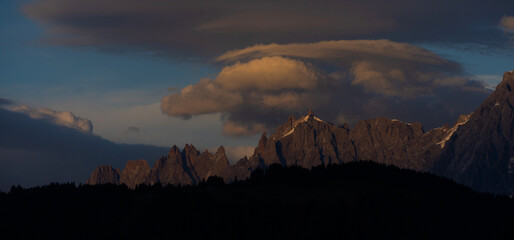Fototapeta premium Summer view of the Mont Blanc massif above forested slopes 