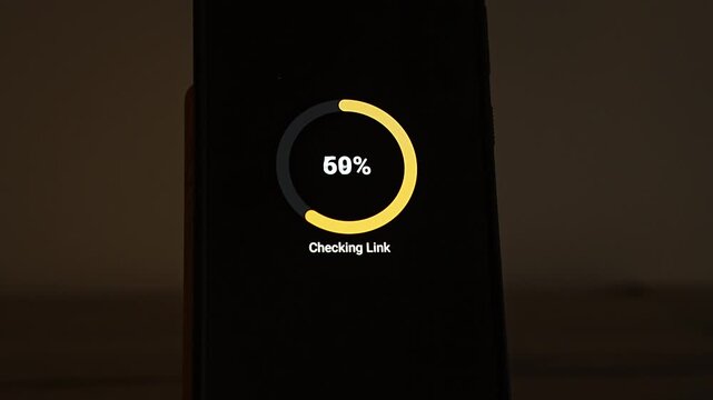 A yellow progress ring at 47 percent sits above the words Checking Link on a smartphone in a dim room. It shows a URL safety scan, link scanner and phishing check running before anyone taps a suspici