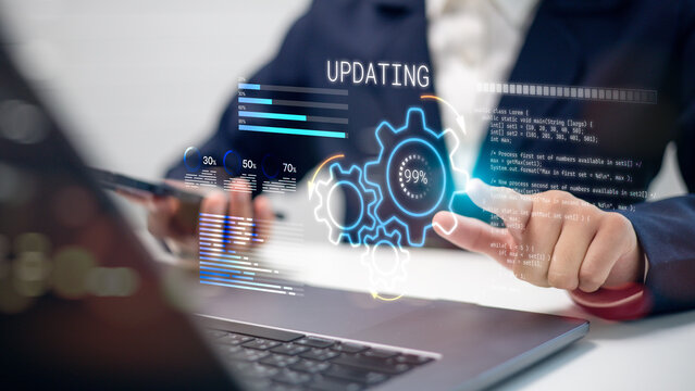 Businessman touching virtual screen updating software system on laptop, programmer developing code, digital process progress bar and gear interface for business technology maintenance concept.