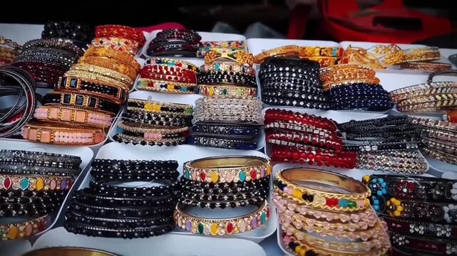 Colorful traditional bangles and bracelets displayed at a local market stall