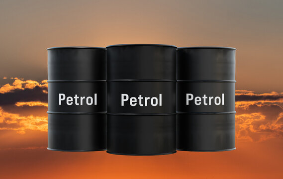 Three black petrol barrels against a sunset background, fuel, commodity, energy, oil and gas industry. Refinery, energy crisis, fuel and power generation, oil production.