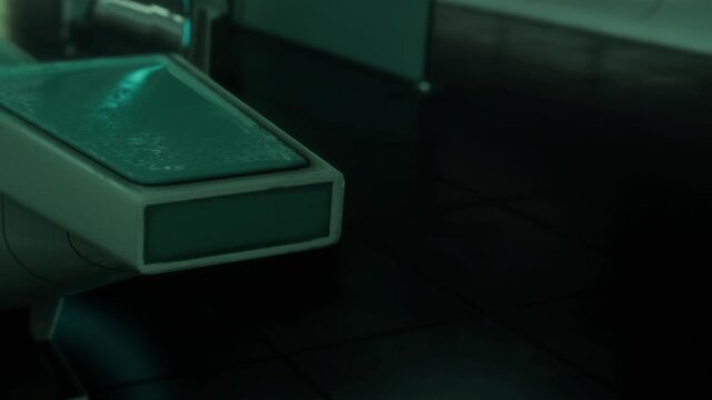 A softly lit medical room stands in eerie silence, with shadows casting over the sleek examination table. Glimmers of teal light enhance the mysterious atmosphere in the space.