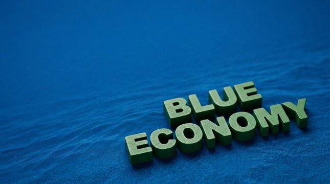 Green 3D Letter Blocks Spelling Blue Economy Concept on Rippling Blue Water Surface