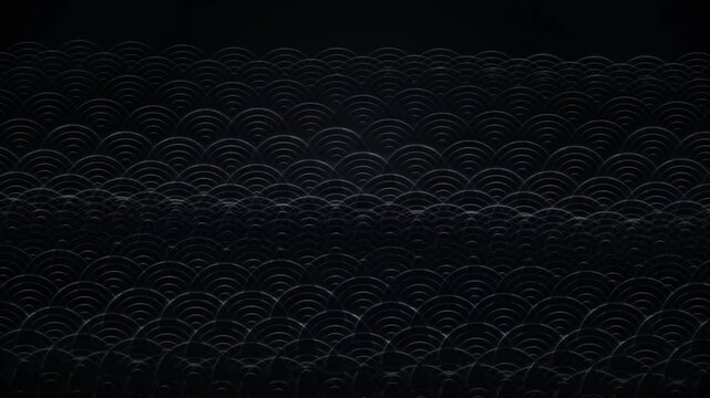 A dark, repeating pattern of grey, almost iridescent scales creates a mesmerizing and subtly textured background.