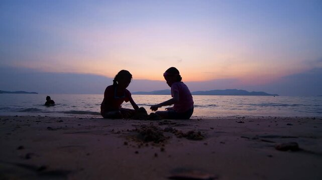 Children playing  joyful at the beach during playful and enjoying funny of summer semester vacations .