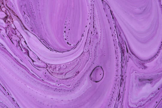 Soft pastel purple fluid acrylic art texture with delicate cell structures and swirling patterns.