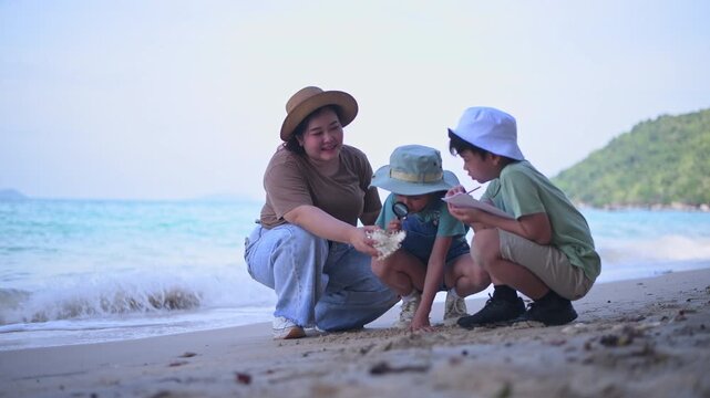 Group of teacher and school children on ecotourist trip and binoculars learning show beach take care of environment.