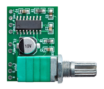 Stereo amplifier board with potentiometer and electrolytic capacitor electronic prototyping module for audio signal control and circuit design on white background