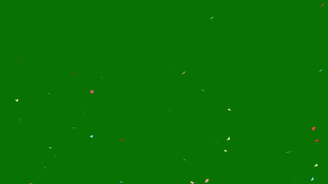 Festive confetti  blast releasing bright paper fragments and colorful streamers against a clean green background in 4k
