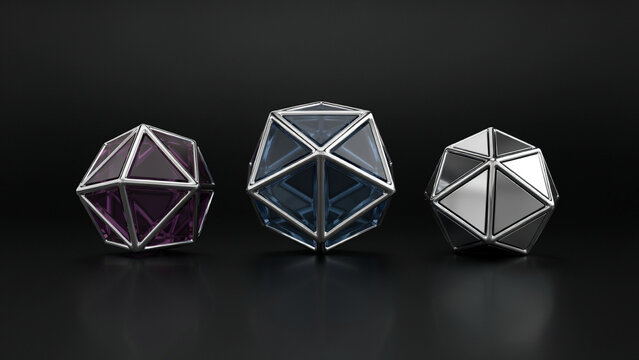 Three geometric polyhedral shapes with metallic frames and translucent colored glass panels, standing on a dark surface against a black background