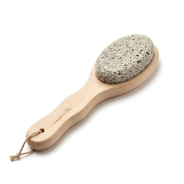 Natural pumice stone on wooden handle brush isolated on white background
