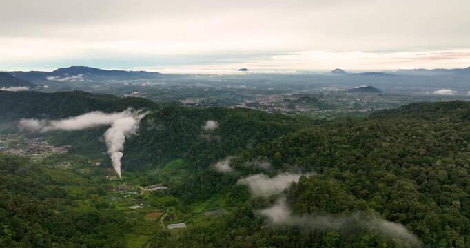 Aerial drone of valley with volcanic activity and village. Sibayak volcano. Berastagi, Sumatra. Indonesia.