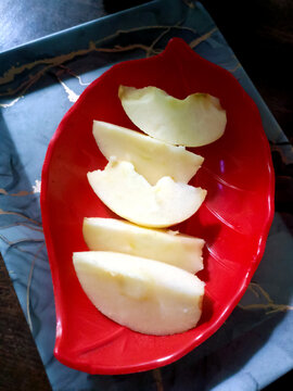 Fresh Apple Slices Served on a Red Leaf Shaped Plate