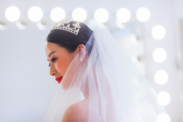 Elegant East Asian Bride Portrait with Pearl Tiara and Beaded Veil, Romantic Wedding Shot © jeson