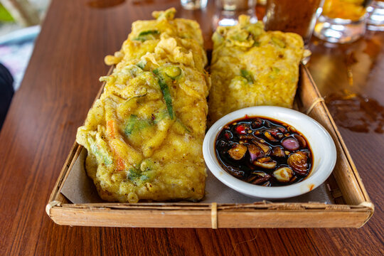 Indonesian Mendoan Tempeh, Thin Fried Soybean Cakes with Seasoned Batter with Soy sauce chili relish