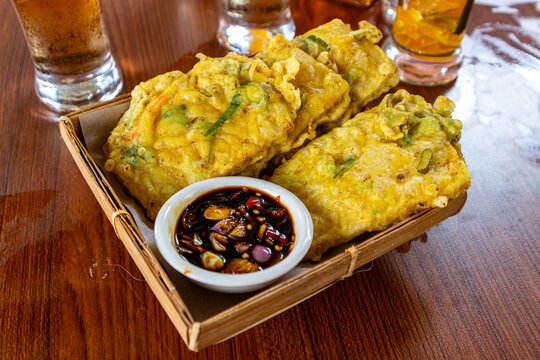 Indonesian Mendoan Tempeh, Thin Fried Soybean Cakes with Seasoned Batter with Soy sauce chili relish