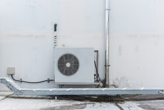 Air Conditioner Outdoor Unit Mounted on Metal Frame