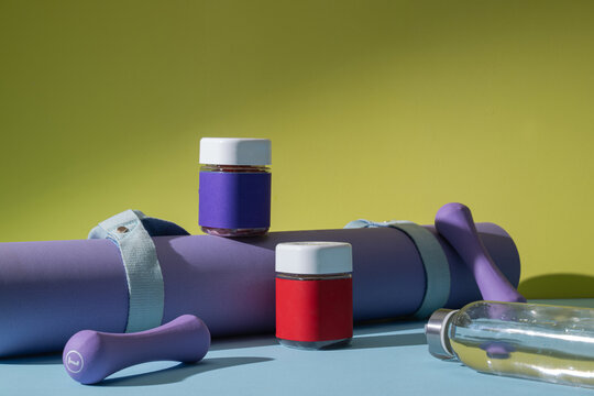 Fitness Gear and Supplements on a textured surface