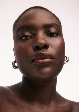 Close up of a Person With Short Hair and Large Earrings