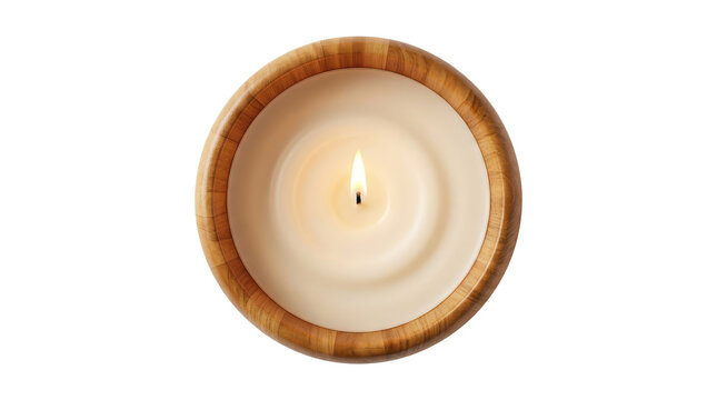 Top down direct overhead view of a single lit white wax candle burning brightly with a glowing orange flame inside a round natural wooden bowl container isolated against a pure white background