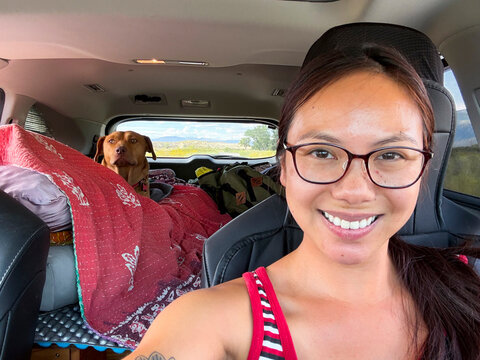 ugc smiling car selfie dog travel companion