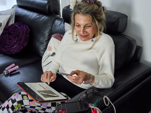 Confident Senior Paying by Credit Card Online