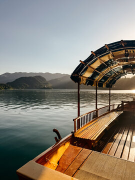 Pletna boat on lake Pled at sunset