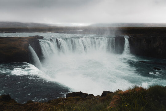 Powerful Icelandic Waterfall in Rugged Landscape