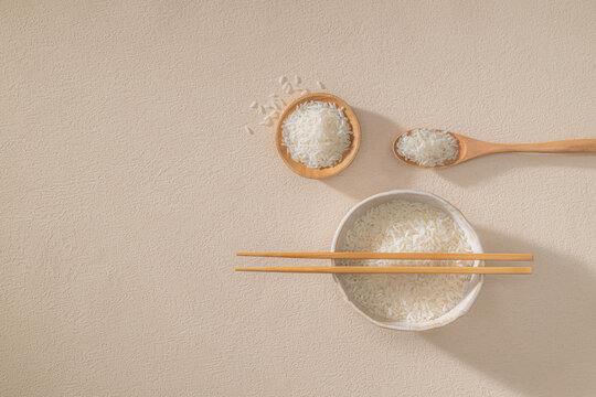 White Rice In Bowl And Spoon