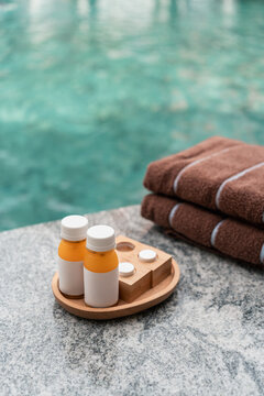 Relaxation Items by the Poolside on a Sunny Day