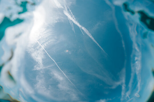 abstract view of blue sky from beneath the surface
