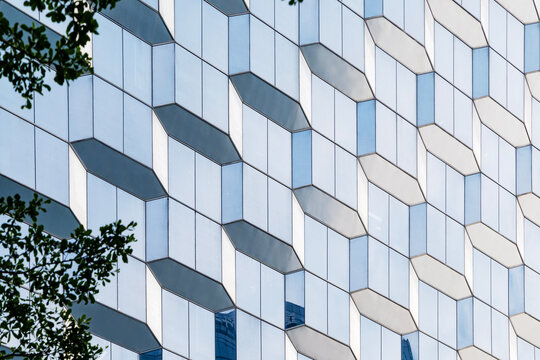 Modern geometric glass facade of office building