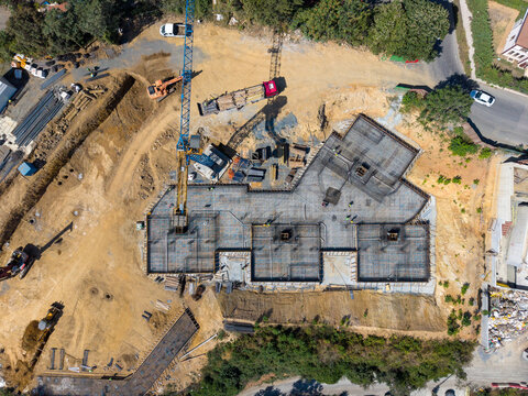 Construction Site Tower Crane And Reinforced Concrete Foundation Rebar