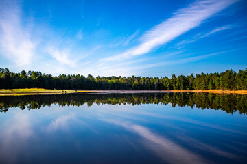 Fototapeta premium Rainbow Flowage - Wisconsin River on a calm morning in northern Wisconsin