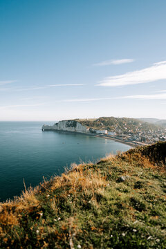 Sunny day at the chalk cliffs of Etretat, France