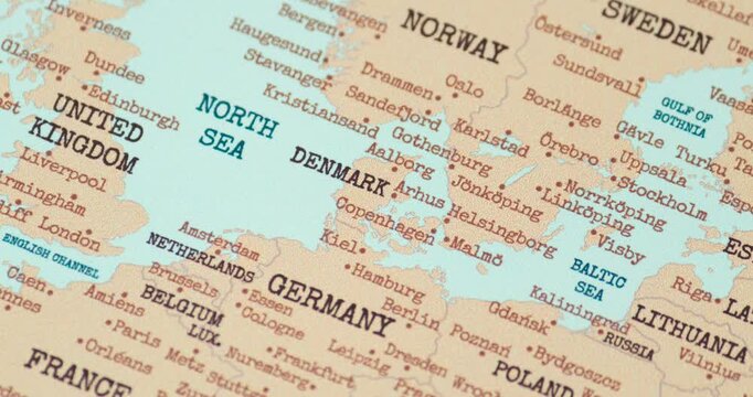Zoom in view of denmark on a vintage political world map