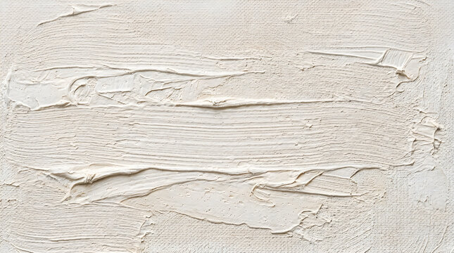 Grey paint brush stroke texture with thick layers and visible ridges on a solid neutral surface