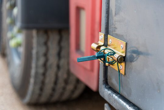 Plastic security seal on the discharge compartment door of a tanker truck
