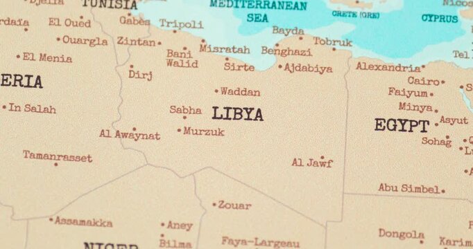 Zoom in view of libya on a vintage political world map