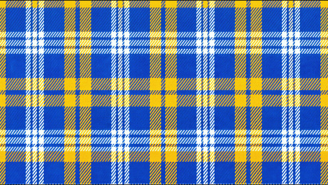 Vibrant blue and yellow tartan plaid fabric pattern featuring classic intersecting lines and textile texture
