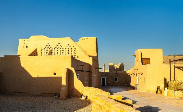 Mud brick buildings of the historic At-Turaif district in Diriyah, Saudi Arabia, showcasing traditional Najdi architecture.