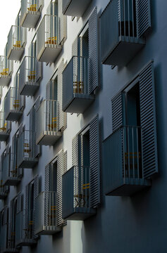 Close up of the facade of a palace and symmetrical balconies in light and dark. Book cover, illustration, symbolic, poster