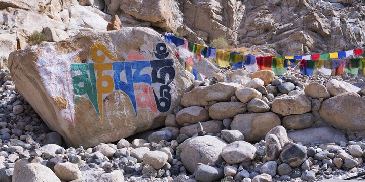 Mani stones with the engraved Tibetan mantra Om Mani Padme Hum, Nubra Valley, Ladakh, Jammu and Kashmir, India